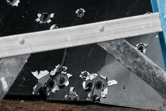 Bullet scarred metal at the scene of the December 10, 2019 shooting at a Jewish Deli, on December 11, 2019 in Jersey City, New Jersey. [Photo: AFP]