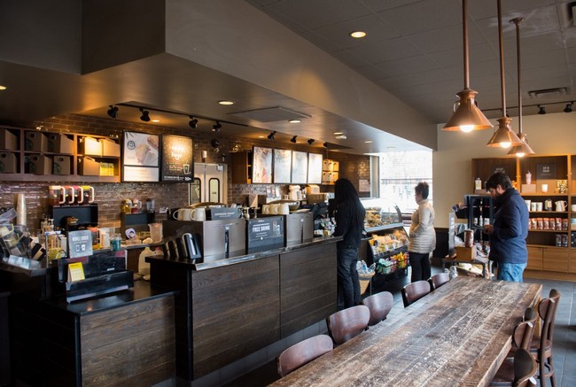 Customers line up inside a Starbucks Coffee shop in Washington, DC, April 17, 2018. [File photo: AFP/ SAUL LOEB]