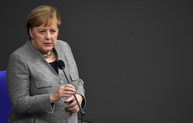 German Chancellor Angela Merkel addresses MPs during a question time at the Bundestag (lower house of parliament) on December 18, 2019 in Berlin. [Photo: AFP]