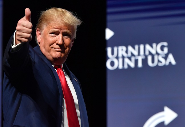 US President Donald Trump gestures during the Turning Point USA Student Action Summit at the Palm Beach County Convention Center in West Palm Beach, Florida on December 21, 2019. [Photo: Nicholas Kamm/AFP]