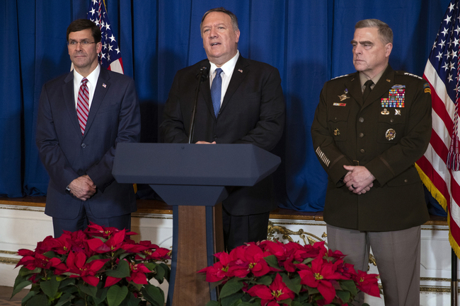 Secretary of Defense Mark Esper, left, and Chairman of the Joint Chiefs of Staff Gen. Mark Milley, right, listen as Secretary of State Mike Pompeo delivers a statement on Iraq and Syria, at President Donald Trump's Mar-a-Lago property, Sunday, Dec. 29, 2019, in Palm Beach, Fla. [Photo: AP/ Evan Vucci]