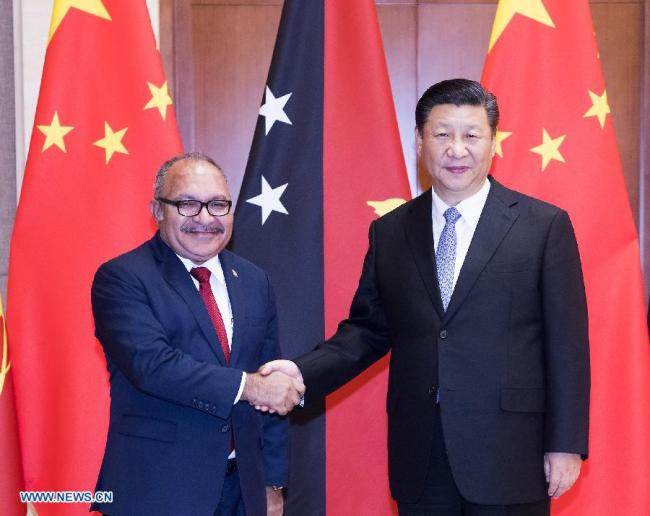 Le président chinois rencontre le PM de la Papouasie-Nouvelle-Guinée, appelant à approfondir la coopération