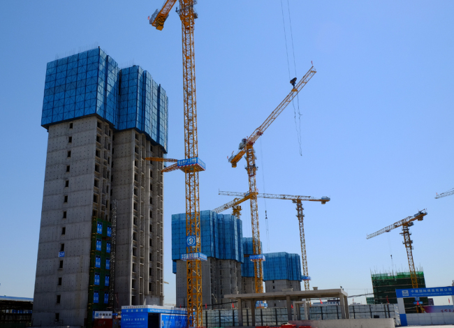 La construction des logements de réinstallation du quartier Beixin'an