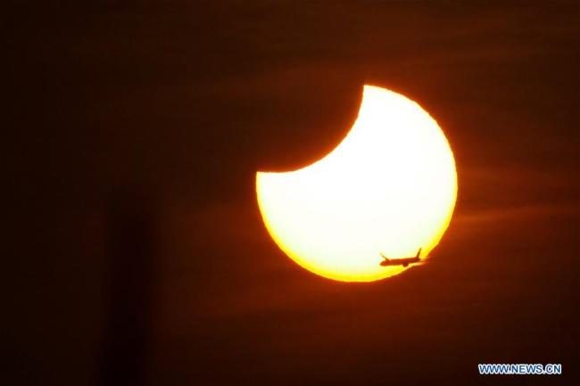Eclipse solaire partielle observée à Beijing, capitale chinoise, le 6 janvier 2019. (Photo : Wang Junfeng)