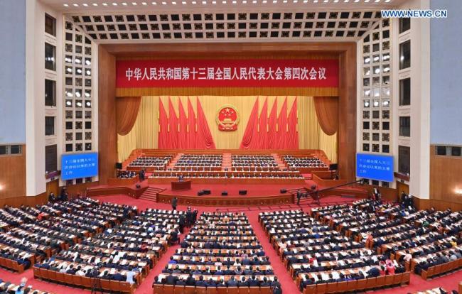 Η δεύτερη συνεδρίαση ολομέλειας της τέταρτης συνόδου του 13ου Εθνικού Λαϊκού Συνεδρίου (NPC) πραγματοποιείται στη Μεγάλη Αίθουσα του Λαού στο Πεκίνο, πρωτεύουσα της Κίνας, στις 8 Μαρτίου 2021. (φωτογραφία: Xinhua)
