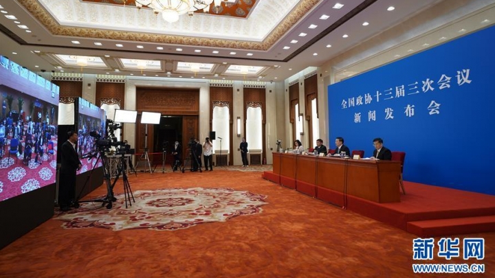 O mais alto órgão de consulta política da China apela para união e cooperação a fim de evitar recessão da economia mundial