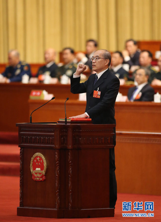 Чжан Цзюнь принес присягу на верность Конституции КНР