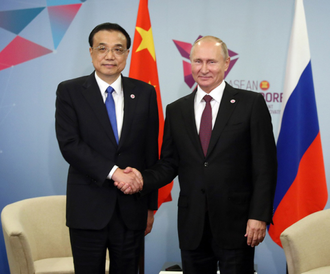 Премьер Госсовета КНР Ли Кэцян встретился с президентом РФ В. Путиным