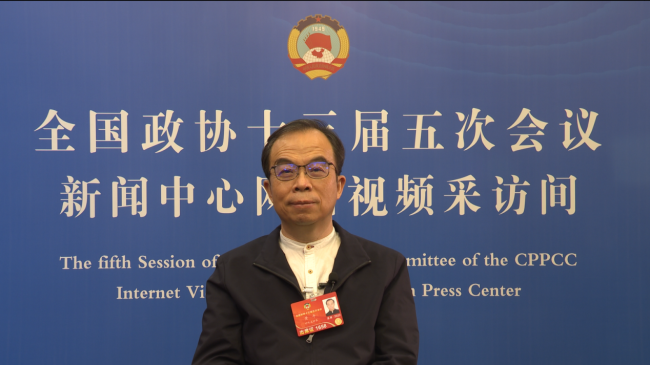Na snímku je člen ČLPPS, výzkumník Čínské akademie společenských věd a bývalý člen think-tanku pro komunikaci a spolupráci mezi Čínou a zeměmi střední a východní Evropy Huang Ping.