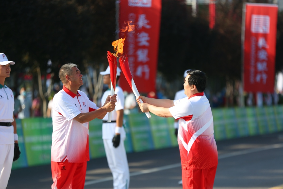 شعلة الدورة ال14 للألعاب الوطنية الصينية تصل إلى مدينة وينان_fororder_1